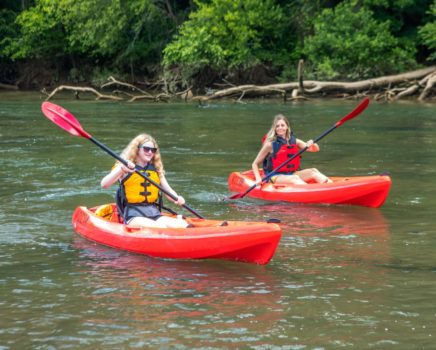 Two girls kayaking on the Chattahoochee River Kayak Rentals - Roswell trip