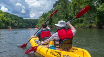 Adults tandem kayaking on the Chattahoochee River Kayak Rentals - Roswell trip