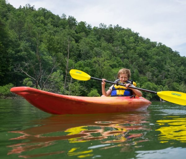boy kayaking on the Fontana Lake Kayak & SUP Rentals trip