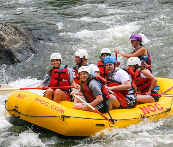 A group french broad river rafting the day away!