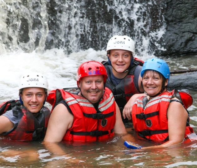 A group french broad river rafting the day away!