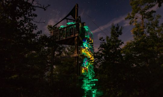 Zip line tower lights on the Moonlight Mountaintop Zip Line Tour trip