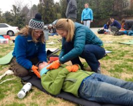 Learning how to wrap an injury during the Wilderness First Aid (WFA) Certification Course – Atlanta