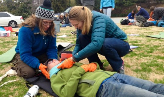 Learning how to wrap an injury during the Wilderness First Aid (WFA) Certification Course – Atlanta