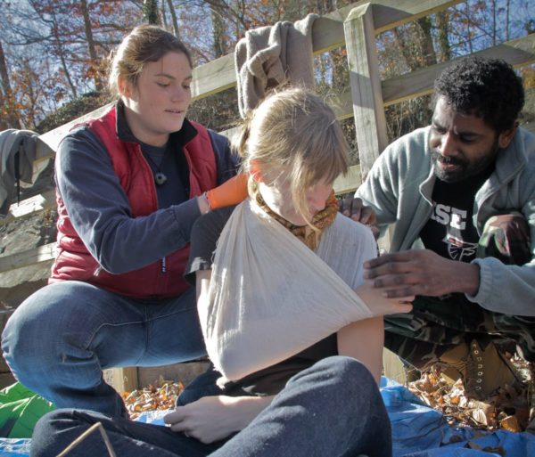 Wrapping an arm during the Wilderness First Aid (WFA) Certification Course - Chattanooga