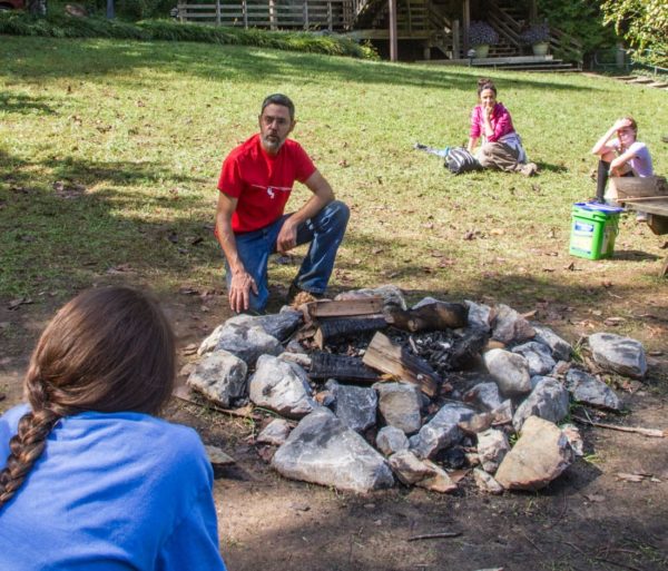 Learning how to make a campfire during the Wilderness Survival course
