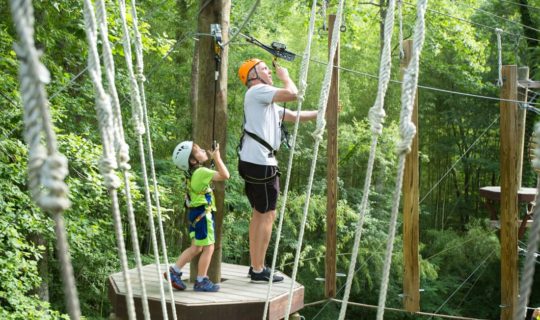 Family on the Zip Line Adventure Park