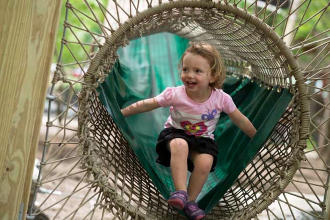 Young girl on the aerial park