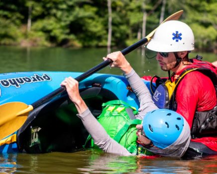 Learning to roll a kayak in paddling school