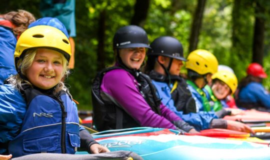 Youth kayaking during Summer Day Camps course