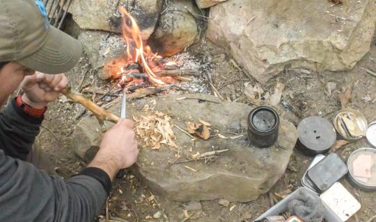 preparing wood for a campfire