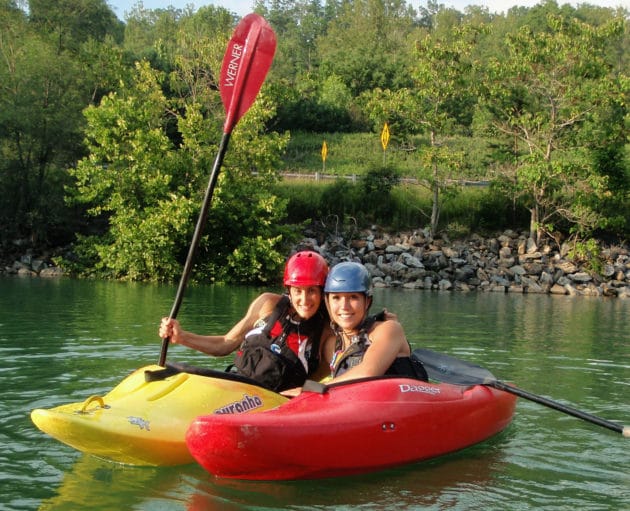 women paddling on kayak