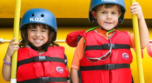 Three young rafters on the Pigeon River Rafting: Lower Pigeon Gorge trip