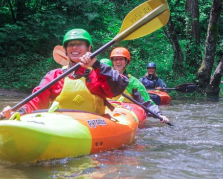 Adults learning to kayak