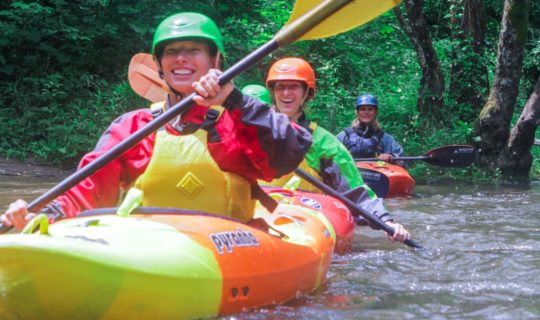 Adults learning to kayak