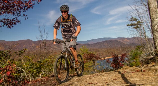 Mountain biker riding bike.