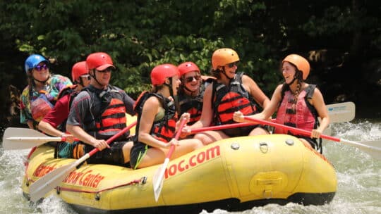 Group of people enjoying Ocoee River Rafting in beautiful Ocoee TN.