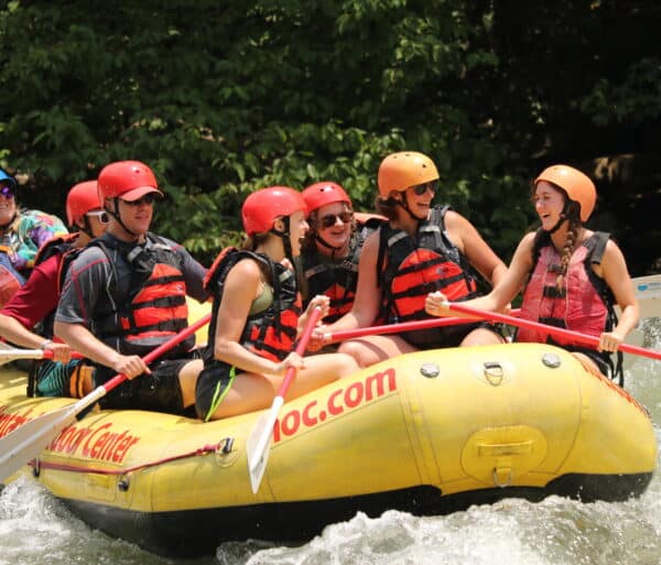 Group of people enjoying Ocoee River Rafting in beautiful Ocoee TN.
