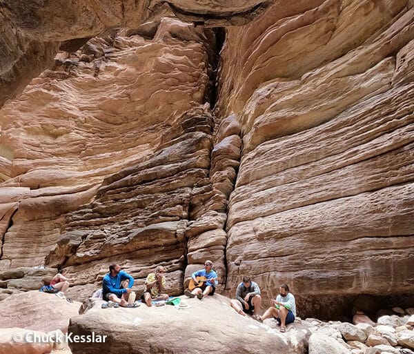 Hiking Group Rests Below Grand Canyon Cliffs