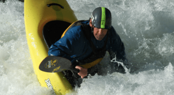 Freestyle Kayaker in a Playboat at NOC