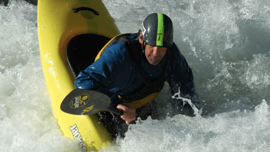Freestyle Kayaker in a Playboat at NOC