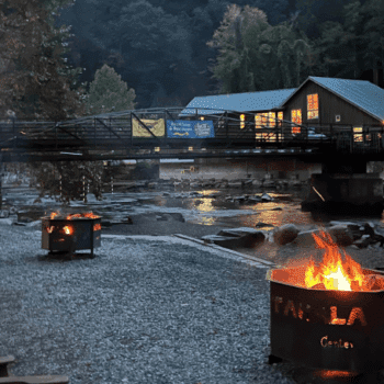 Bonfire glow by the Nantahala River at NOC in Bryson City, NC.