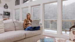 fall-hemlocks-wfh-laptop-couch-view-winter
