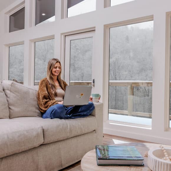 fall-hemlocks-wfh-laptop-couch-view-winter