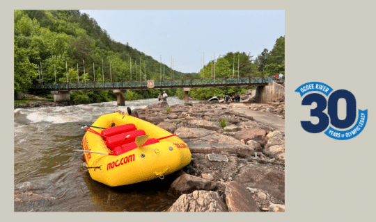 NOC raft at the Ocoee River put-in near the Whitewater Center bridge in Tenne