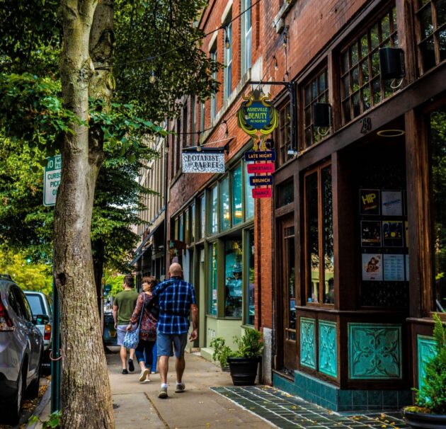 Downtown Asheville shops and pedestrians, photo by Jehu Israel