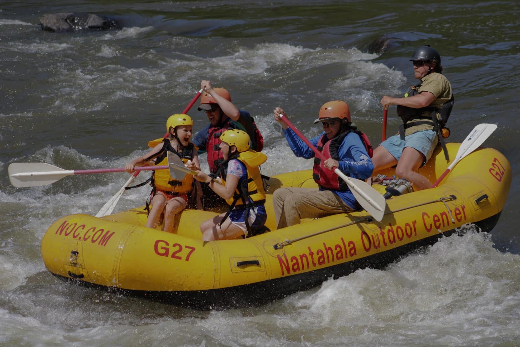 Guests on a french broad rafting trip